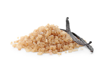 Brown vanilla sugar and sticks on white background