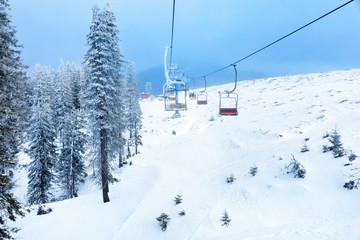 Ski lift at mountain resort. Winter vacation