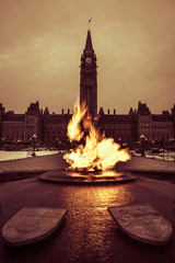 View of Peace Tower and Centennial Flame at Parliament complex Ottawa, Canada 