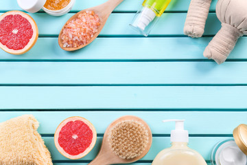 Flat lay composition with body care products on wooden background
