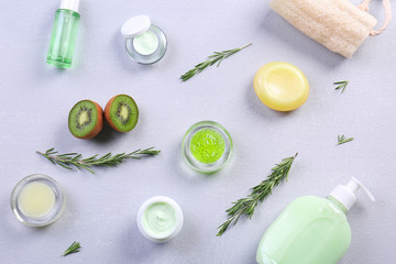 Flat lay composition with body care products on color background