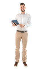 Naklejka na ściany i meble Male teacher with book on white background