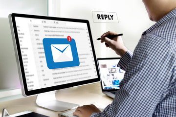 reply the message email on computer Businessman is working to important reminder