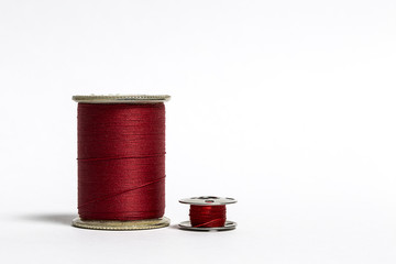 Spool of Red Thread with corresponding Bobbin