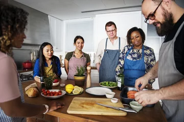 Wall murals Cooking Diverse people joining cooking class