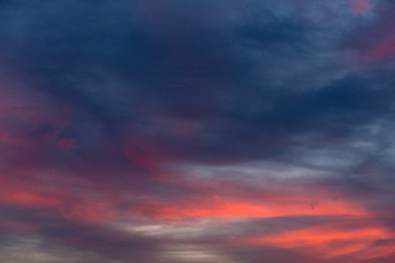 Silhouette of cellular tower with beautiful sunset cloudy sky