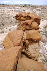 Eroded sandstone hoodoo formation in the in the desert badlands of Bisti De Na Zin In Notthern New Mexico