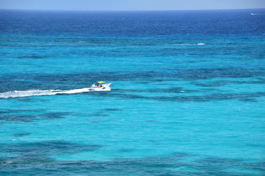 Canc&uacute;n is just north of Mexico's Caribbean coast resort band known as the Riviera Maya. In older English-language documents, the city&rsquo;s name is sometimes spelled "Cancoon," an attempt to convey the so