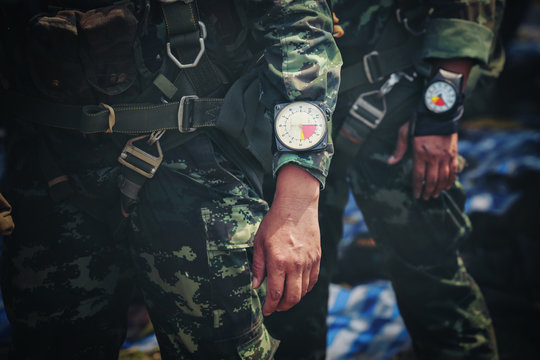 Hand In Glove With The Parachutist Altimeter Close Up.