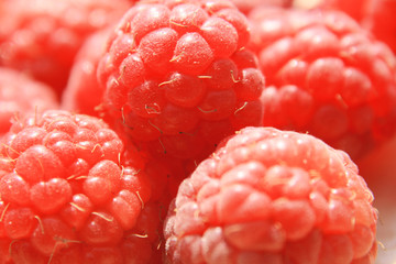 ripe raspberry is on the table.