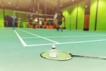 Tennis players playing a match on the court on a sunny day