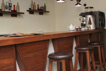 cafe interior design with bar and wooden chairs
