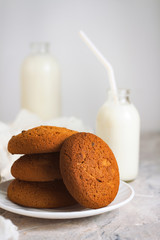 Healthy Breakfast with Oatmeal Cookies and Milk on a light background. Concept Healthy Eating