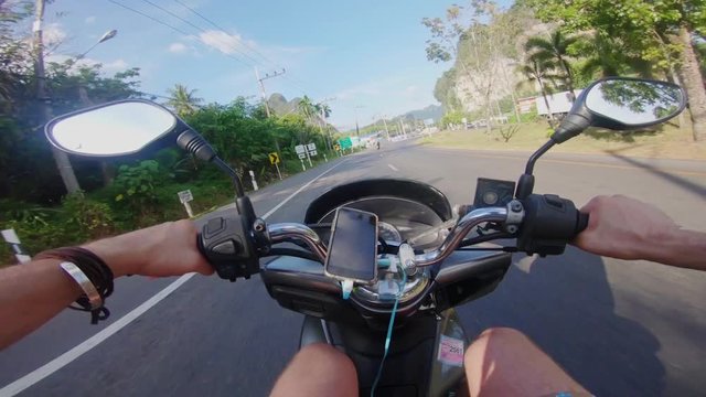 Bike street first person view scooter asia thailand urban city and jungle ride