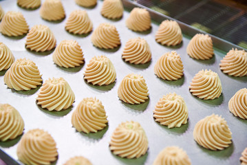Confectionery cream on baking sheet
