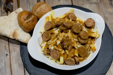 Restaurant dishes salads French fries cutlets olives