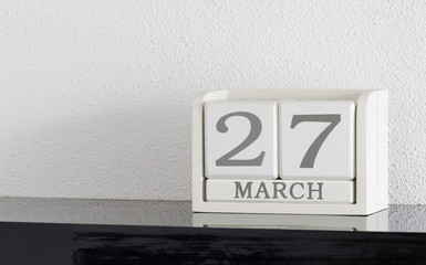 White block calendar present date 27 and month March
