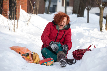 woman slipping on sidewalk,  winter accident
