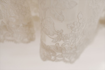 Fototapeta na wymiar Beautiful lace with flower pattern - macro photo