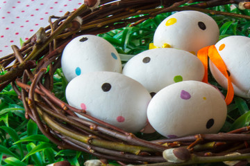 Nest with colorful eggs 