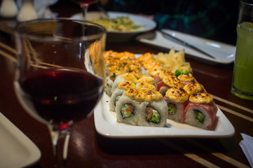 Fototapeta na wymiar Rainbow Sushi Roll with salmon