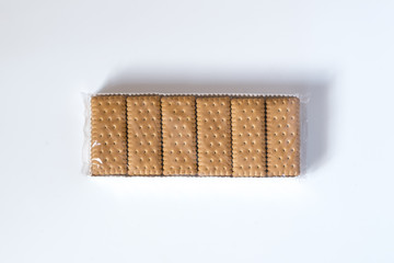 a pack of cookies on a white surface