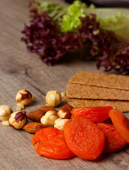 the concept of proper nutrition: dried fruits, greens, nuts
