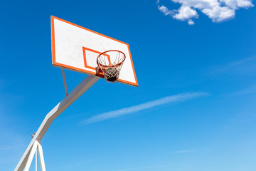 basketball close up, basketball bal in hoop at sunny day