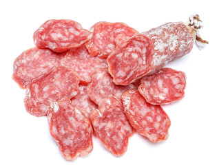 Dried organic salami sausage on white background