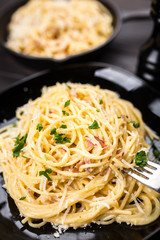 Spaghetti carbonara with egg and pancetta
