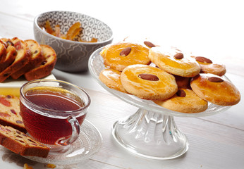 cup of tea with dried fruit cake