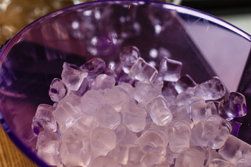 ice cubes in a violet plate