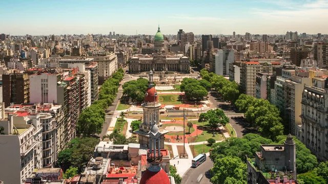 Buenos Aires, Argentina, time lapse view of cityscape including National Congress building and Plaza del Congreso square. Zoom out.