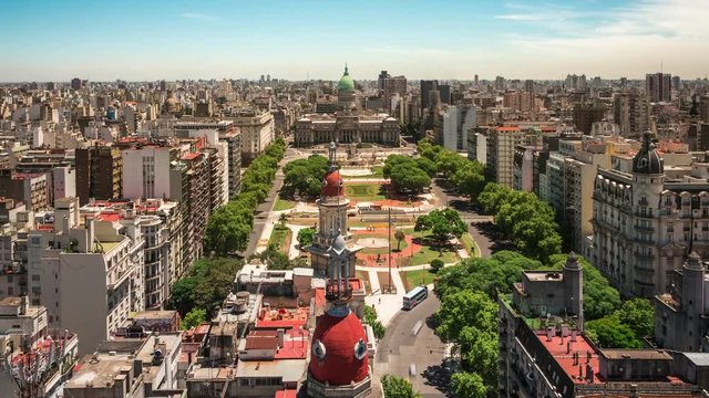 Buenos Aires, Argentina, time lapse view of cityscape including National Congress building and Plaza del Congreso square. Zoom in.