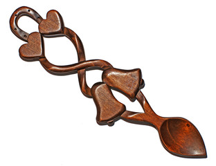 A traditional wooden Love Spoon as produced over the years in Wales.