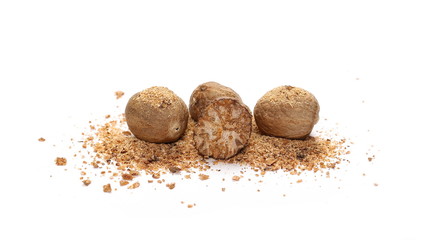 Nutmeg with milled powder isolated on white background
