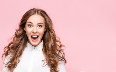 Surprised happy beautiful woman looking in excitement.
