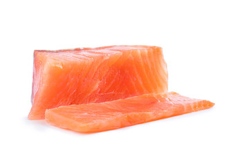 Chopped salmon slices close-up on white background