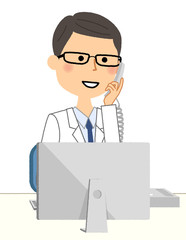 白衣の男性　PCと電話