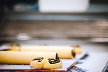 Dough cake on table in confectionery preparing cookies