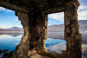 landscape of Lake Varese, through a broken wall,varese,Lombardy,Italy