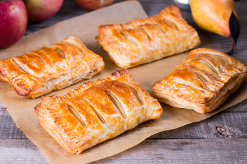 Homemade cakes and puff pastry with apples and caramel