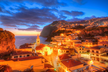 Naklejka premium Night panorama of Camara de Lobos village in Madeira island, Portugal