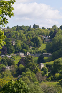 Homes on the wooded valley hillsides near Stroud, Gloucestershire, UK