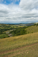 Fototapeta premium Summer view from Rodborough Common in The Cotswolds, over the Severn Vale towards the Forest of Dean beyond, Gloucestershire, UK