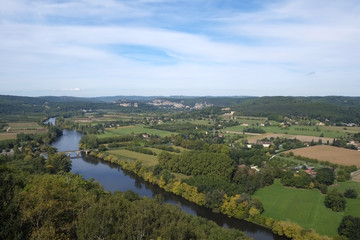 Late summer view over patchwork fields and river of the Dordogne valley from Domme, Aquitane, France