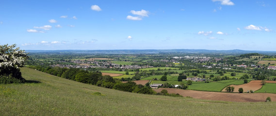 Panoramic view from Selsley Common over a patchwork of fields in The Severn Vale, Gloucestershire,...