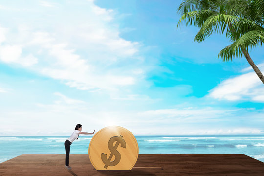 Young asian business woman savings golden coin - Powered by Adobe