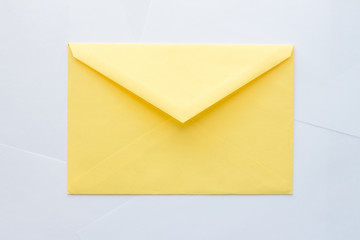 Yellow envelope on white background