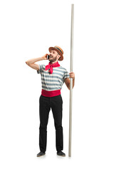 Caucasian man in traditional gondolier costume and hat